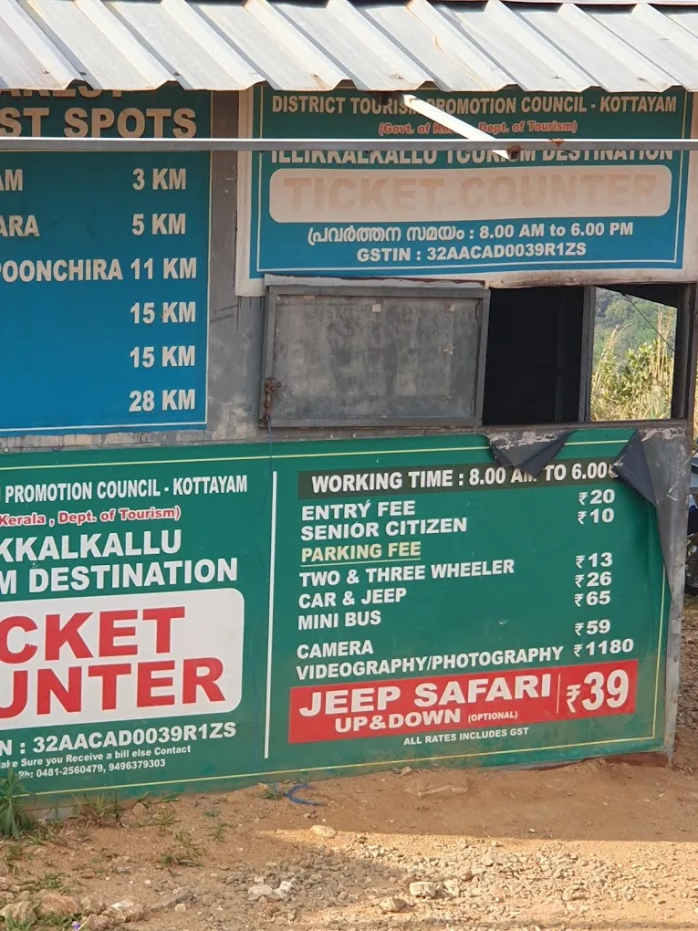 Ilaveezhapoonchira misty landscape at sunrise with rolling green hills and panoramic valley view in Kottayam, Kerala.